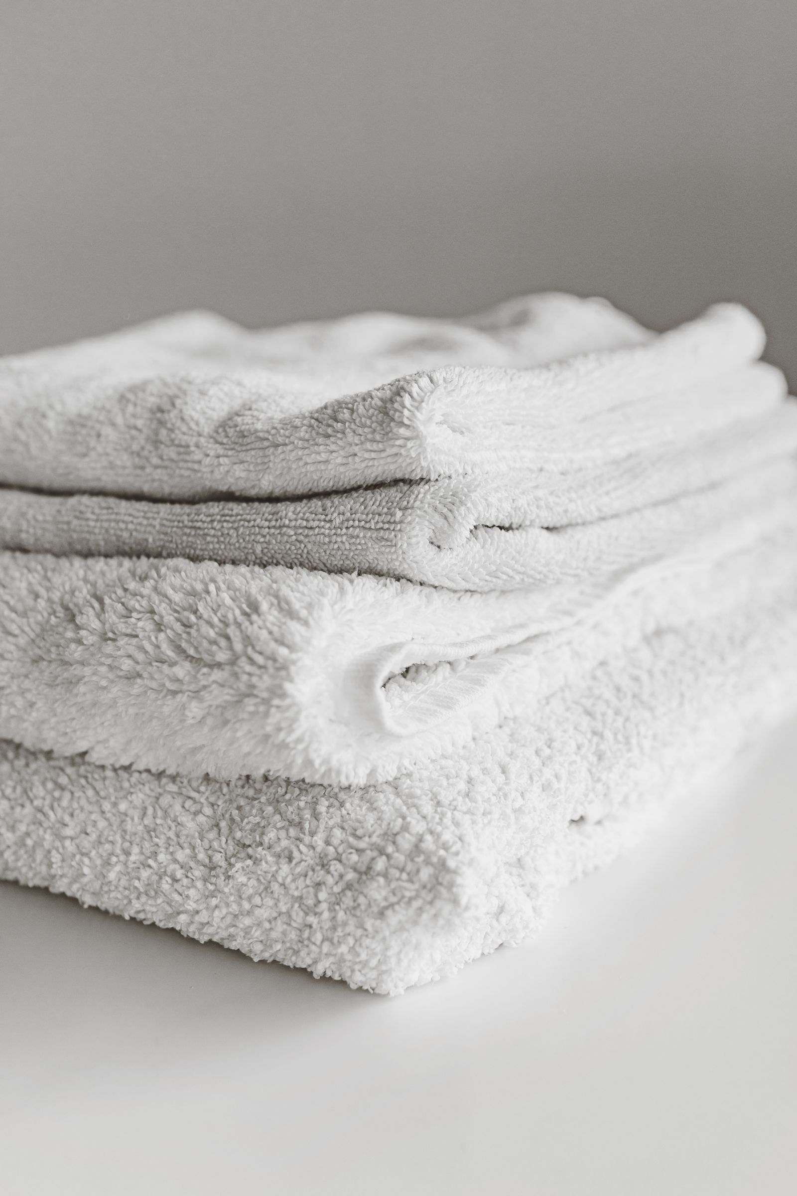 Stack of folded white cotton towels